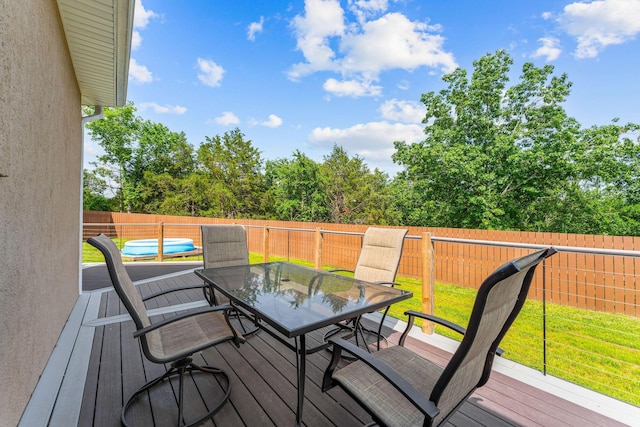 770 Mills Hollow Rd, Branson, MO 65616 - deck with outdoor dining space and a fenced backyard