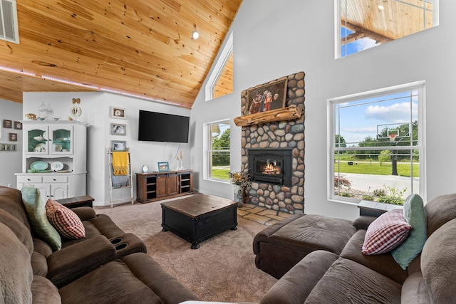 770 Mills Hollow Rd, Branson, MO 65616 - carpeted living room with high vaulted ceiling, a fireplace, wood ceiling, and plenty of natural light