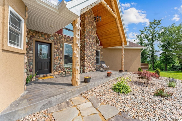 770 Mills Hollow Rd, Branson, MO 65616 - entrance to property with stucco siding, covered porch, and stone siding