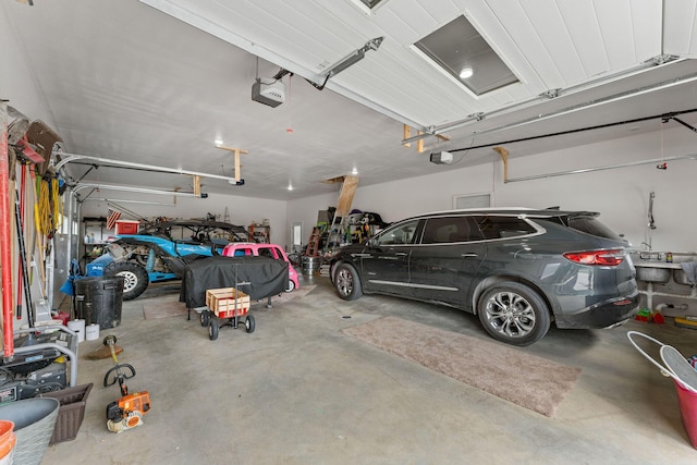 770 Mills Hollow Rd, Branson, MO 65616 - garage featuring a garage door opener