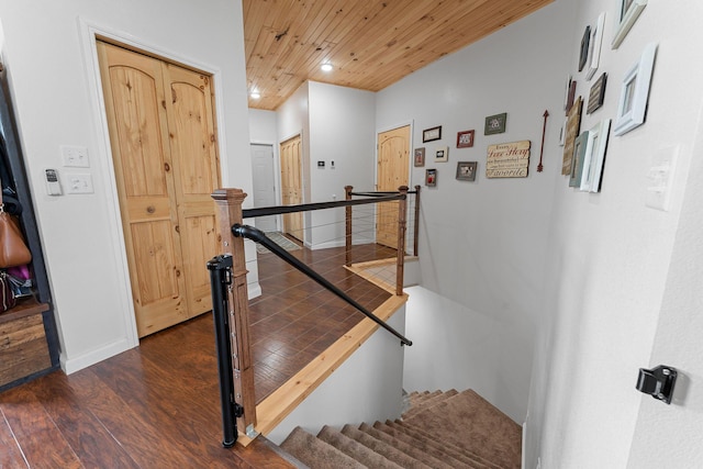 770 Mills Hollow Rd, Branson, MO 65616 - staircase with wooden ceiling, wood finished floors, and recessed lighting