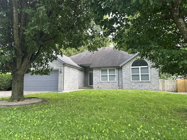 3454 W Countryside Dr, Springfield, MO 65807 - single story home featuring a garage, brick siding, and a shingled roof