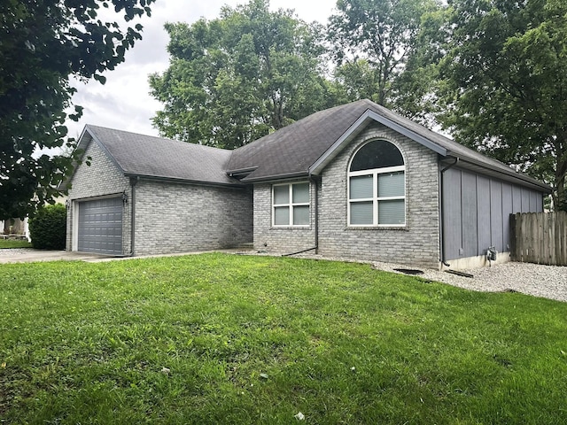 3454 W Countryside Dr, Springfield, MO 65807 - ranch-style house with a garage, brick siding, and driveway