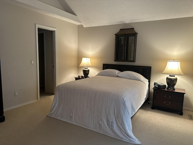 3454 W Countryside Dr, Springfield, MO 65807 - bedroom featuring vaulted ceiling, light colored carpet, and a textured ceiling