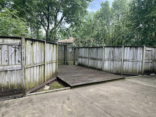 3454 W Countryside Dr, Springfield, MO 65807 - wooden deck with a fenced backyard