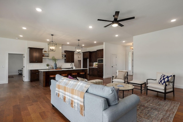 1756 N Marlowe Ave, Springfield, MO 65802 - living area featuring a ceiling fan, recessed lighting, dark wood finished floors, and a chandelier