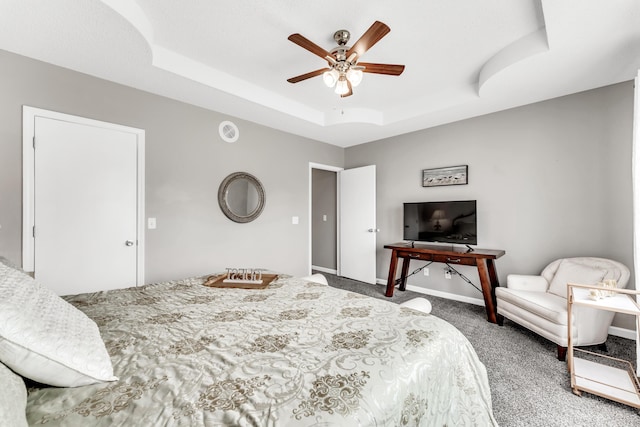 280 W Woodland Dr Unit Ld, Branson, MO 65616 - carpeted bedroom featuring a raised ceiling and ceiling fan