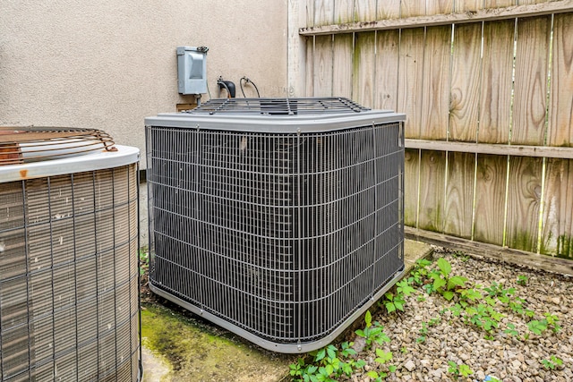 280 W Woodland Dr Unit Ld, Branson, MO 65616 - exterior view of a central air condition unit and stucco siding