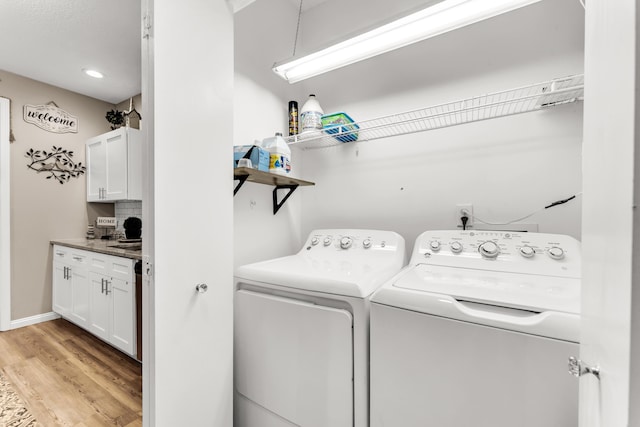 280 W Woodland Dr Unit Ld, Branson, MO 65616 - laundry area with washer and clothes dryer, light wood-style floors, and recessed lighting