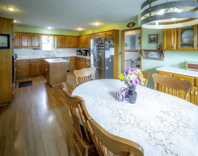 9396 Lawrence Unit 2040, Miller, MO 65707 - dining area featuring wood finished floors and recessed lighting