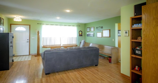 9396 Lawrence Unit 2040, Miller, MO 65707 - living room featuring light wood-type flooring
