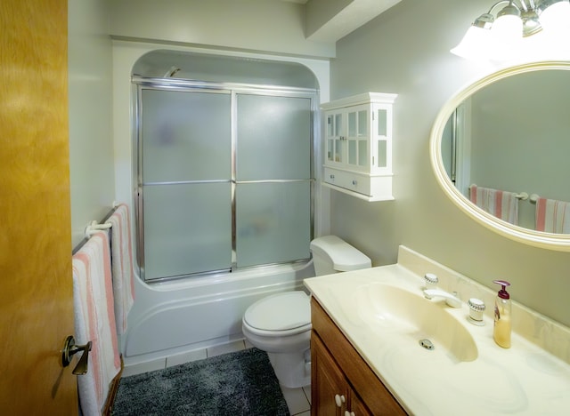 9396 Lawrence Unit 2040, Miller, MO 65707 - bathroom with vanity, bath / shower combo with glass door, and tile patterned flooring