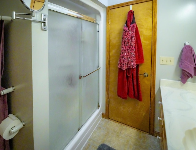 9396 Lawrence Unit 2040, Miller, MO 65707 - bathroom with a stall shower, vanity, and tile patterned flooring