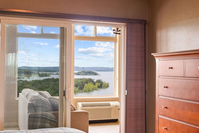 200 Majestic Dr Unit 1-303, Branson, MO 65616 - bedroom featuring a water view and an AC wall unit