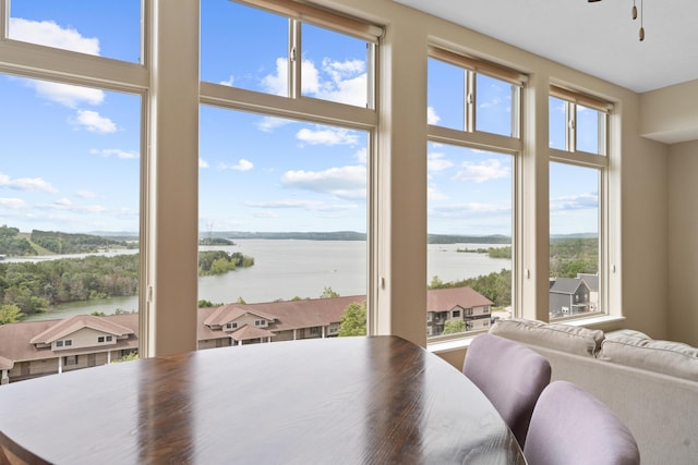 200 Majestic Dr Unit 1-303, Branson, MO 65616 - dining area with a water view, healthy amount of natural light, and ceiling fan