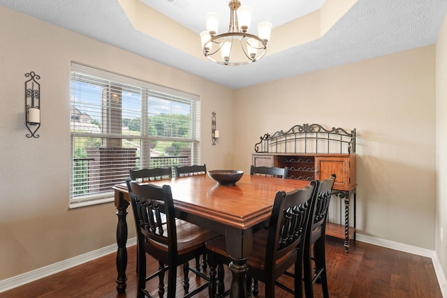 200 Majestic Dr Unit 1-303, Branson, MO 65616 - dining room featuring a chandelier and dark wood-type flooring