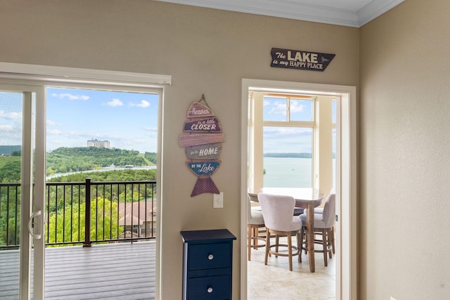 200 Majestic Dr Unit 1-303, Branson, MO 65616 - dining area with crown molding, healthy amount of natural light, and light tile patterned floors