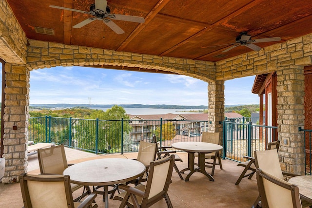 200 Majestic Dr Unit 1-303, Branson, MO 65616 - view of patio featuring a ceiling fan and outdoor dining area