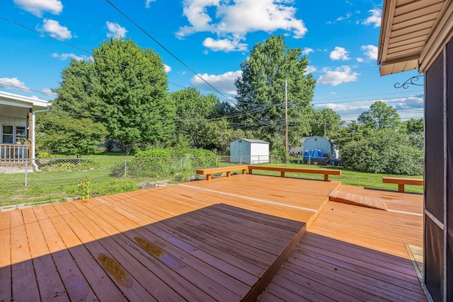 829 W Highland St, Springfield, MO 65807 - wooden deck with a storage shed