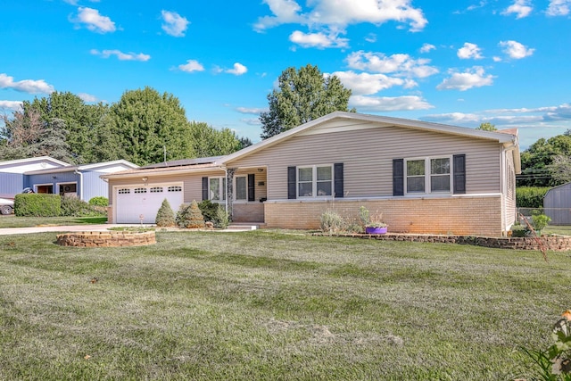 829 W Highland St, Springfield, MO 65807 - single story home featuring a garage, brick siding, and a front lawn