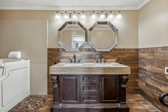 829 W Highland St, Springfield, MO 65807 - bathroom featuring double vanity, tile walls, crown molding, and tile patterned floors