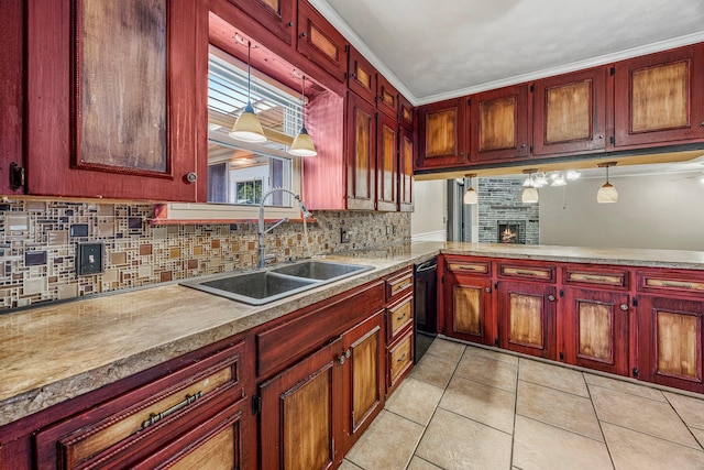 829 W Highland St, Springfield, MO 65807 - kitchen with dark brown cabinets, backsplash, light tile patterned floors, hanging light fixtures, and light countertops