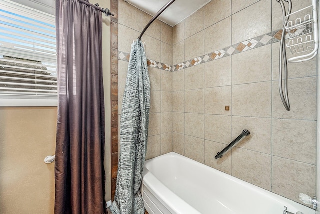 829 W Highland St, Springfield, MO 65807 - bathroom featuring shower / bathtub combination with curtain