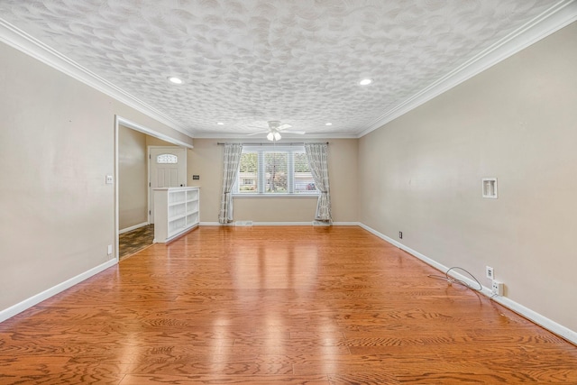 829 W Highland St, Springfield, MO 65807 - spare room featuring ceiling fan, light wood-style floors, ornamental molding, and recessed lighting