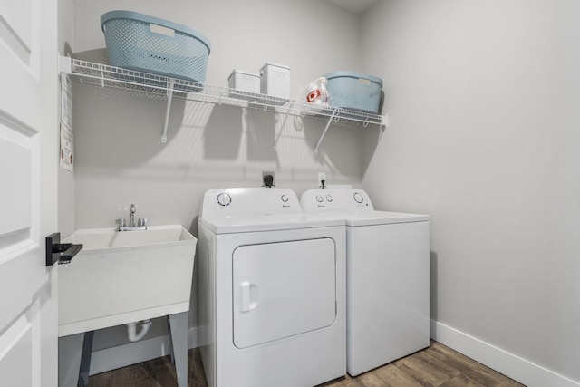 34 Shellie Ln, Branson, MO 65616 - laundry room with separate washer and dryer and wood finished floors