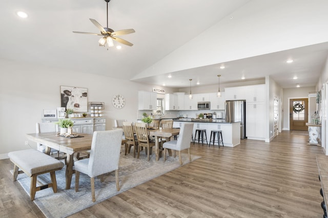 34 Shellie Ln, Branson, MO 65616 - dining area featuring light wood-type flooring, recessed lighting, ceiling fan, and vaulted ceiling