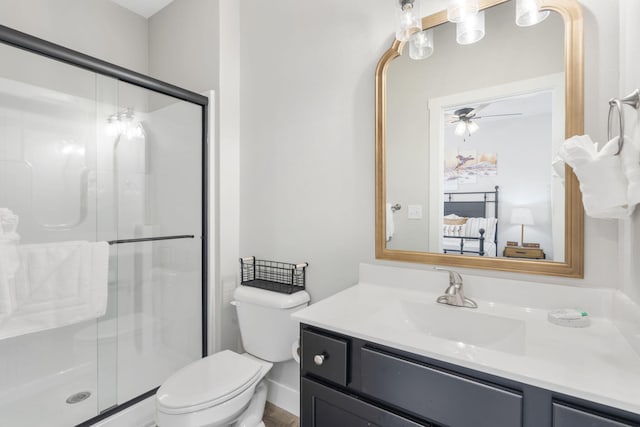 34 Shellie Ln, Branson, MO 65616 - bathroom featuring vanity, a shower stall, and ceiling fan