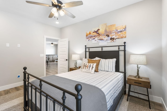 34 Shellie Ln, Branson, MO 65616 - bedroom featuring wood finished floors, ceiling fan, and recessed lighting