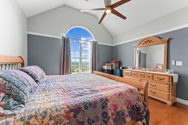 110 Cottonwood Trl Unit 2D, Branson, MO 65616 - bedroom featuring wood finished floors, vaulted ceiling, and a ceiling fan