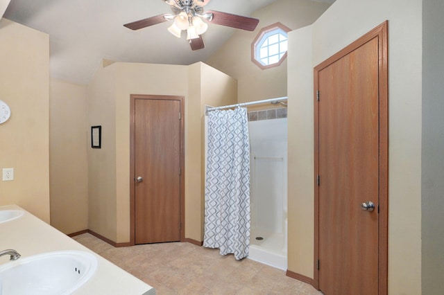 608 S Ashwood Ct, Nixa, MO 65714 - full bathroom featuring ceiling fan, a shower stall, lofted ceiling, double vanity, and tile patterned floors