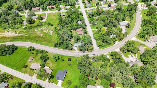 705 Preacher Roe Blvd, West Plains, MO 65775 - aerial perspective of suburban area featuring a tree filled landscape