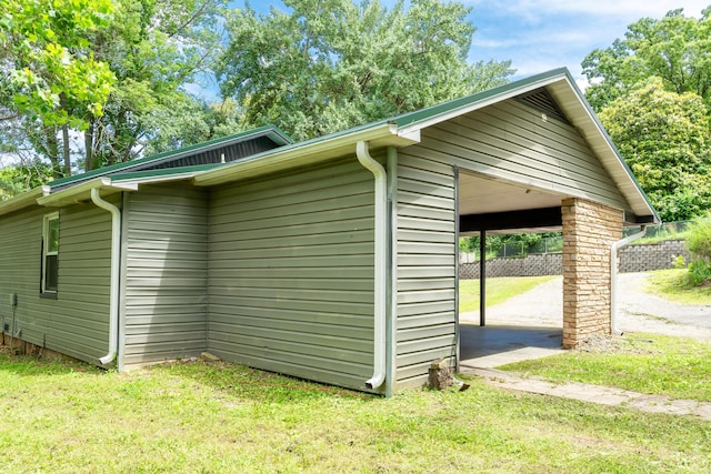 705 Preacher Roe Blvd, West Plains, MO 65775 - view of side of home with a lawn