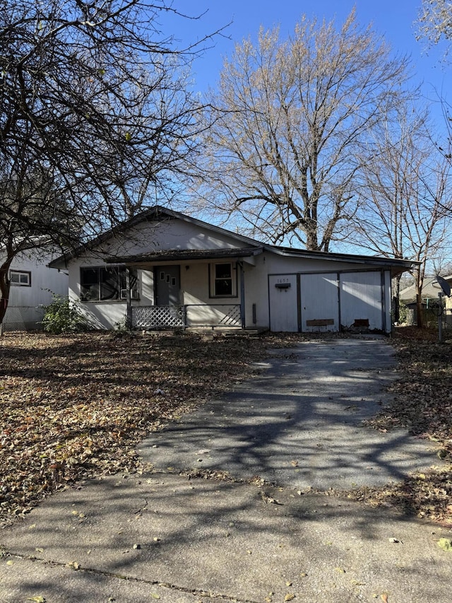 1657 N Hayes Ave, Springfield, MO 65803 - view of front of property with asphalt driveway