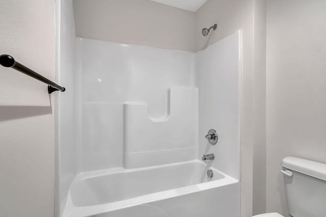 921 S Deerfield Ct, Nixa, MO 65714 - bathroom featuring toilet and shower / washtub combination