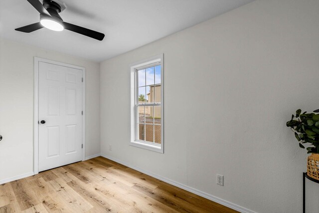 1024 N Fulbright Ave, Springfield, MO 65802 - unfurnished bedroom featuring light wood finished floors and ceiling fan