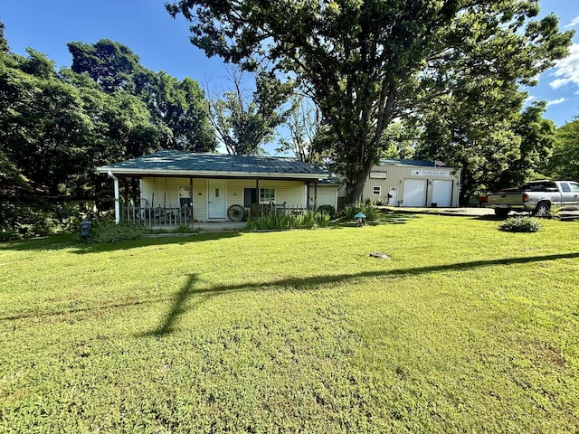 1235 W State Route 17, Houston, MO 65483 - back of house with a lawn and covered porch