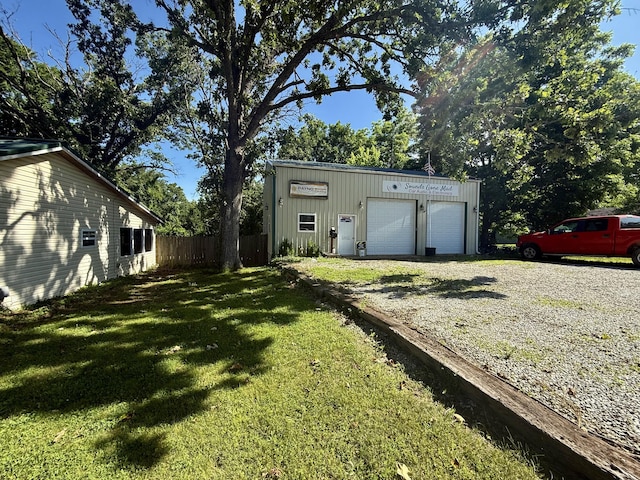 1235 W State Route 17, Houston, MO 65483 - view of yard with a garage and an outbuilding