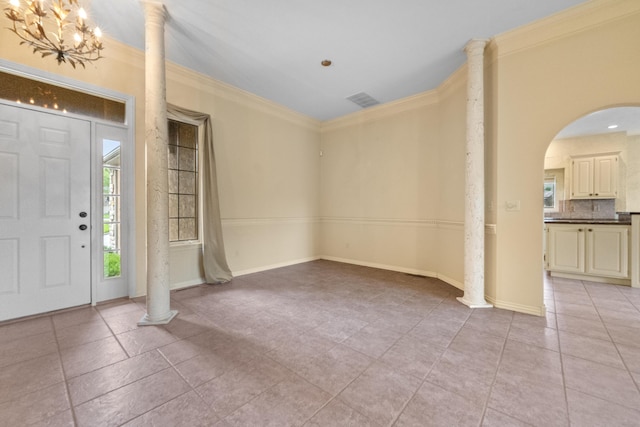 966 S Carriage Ave, Springfield, MO 65809 - entrance foyer featuring ornamental molding, arched walkways, light tile patterned floors, and a chandelier