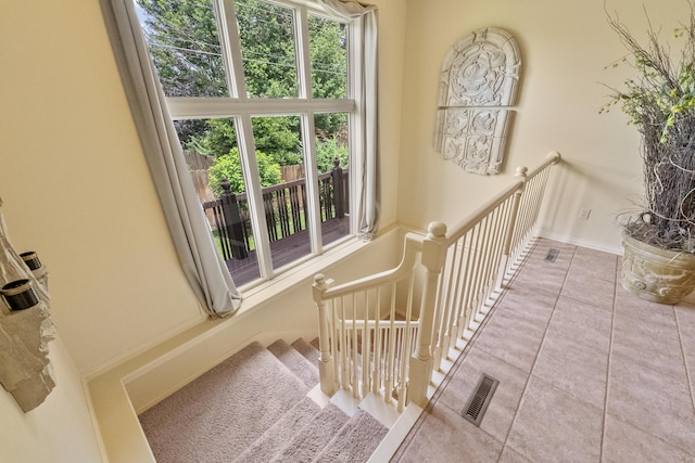 966 S Carriage Ave, Springfield, MO 65809 - stairs featuring tile patterned floors and baseboards