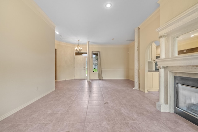 966 S Carriage Ave, Springfield, MO 65809 - unfurnished living room featuring a glass covered fireplace, a chandelier, ornamental molding, light tile patterned floors, and recessed lighting