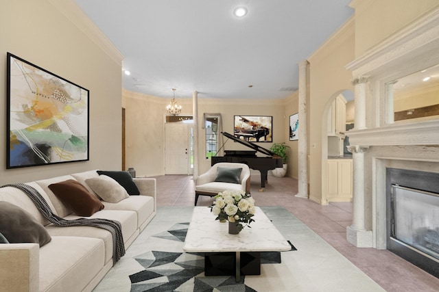 966 S Carriage Ave, Springfield, MO 65809 - living room with a chandelier, crown molding, light tile patterned floors, a glass covered fireplace, and recessed lighting