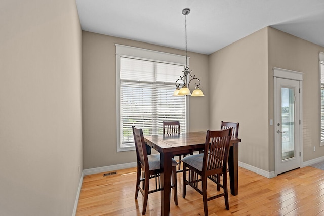 628 N Alexandria St, Nixa, MO 65714 - dining area with light wood finished floors and baseboards