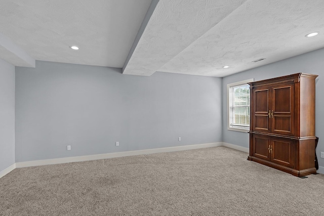 628 N Alexandria St, Nixa, MO 65714 - unfurnished room featuring a textured ceiling, light carpet, and recessed lighting
