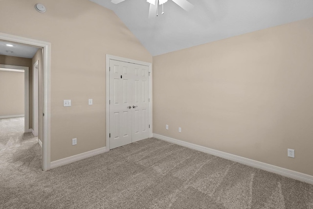 628 N Alexandria St, Nixa, MO 65714 - unfurnished bedroom featuring carpet flooring, vaulted ceiling, a closet, and a ceiling fan