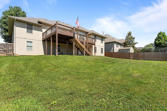 628 N Alexandria St, Nixa, MO 65714 - back of property with a wooden deck, stairway, and a fenced backyard