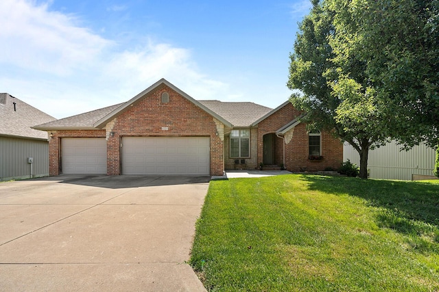 628 N Alexandria St, Nixa, MO 65714 - view of front of home featuring brick siding, concrete driveway, a front yard, a garage, and roof with shingles